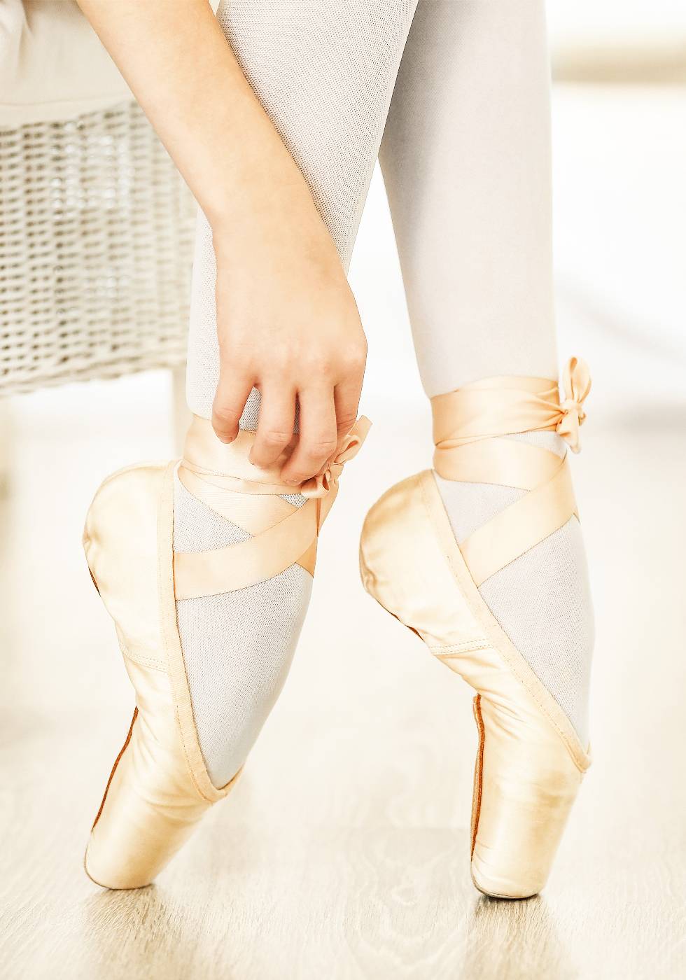 Ballerina Tying Ballet Shoes Poster