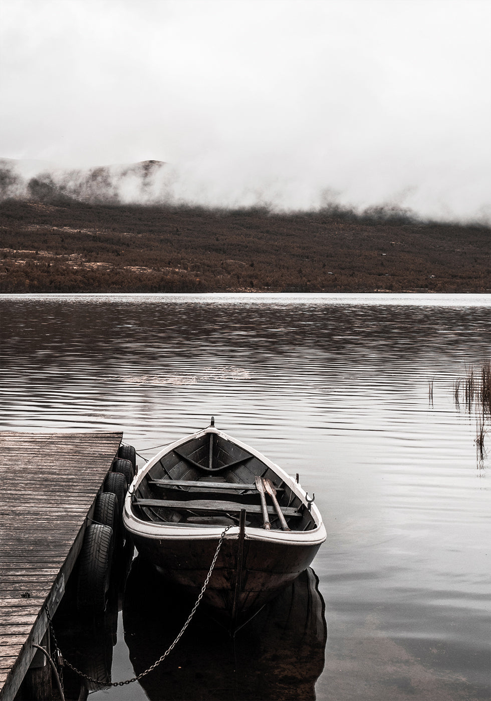 Boat In A Lake Near The Mountains Plakat